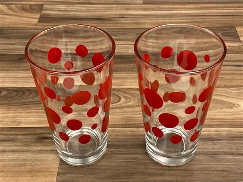 glasses with pink polka dots.